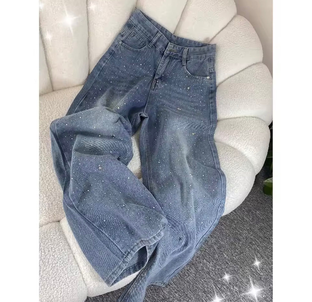 Pantaloni in denim con diamanti brillanti