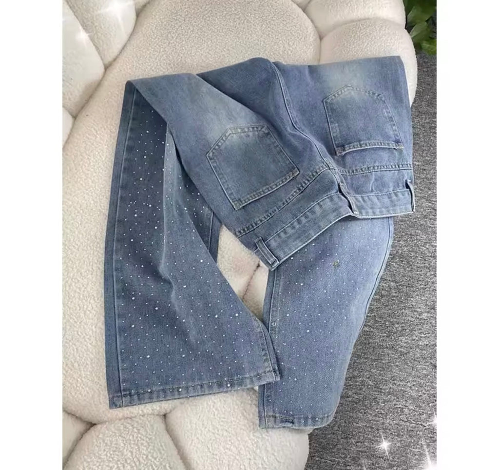 Pantaloni in denim con diamanti brillanti
