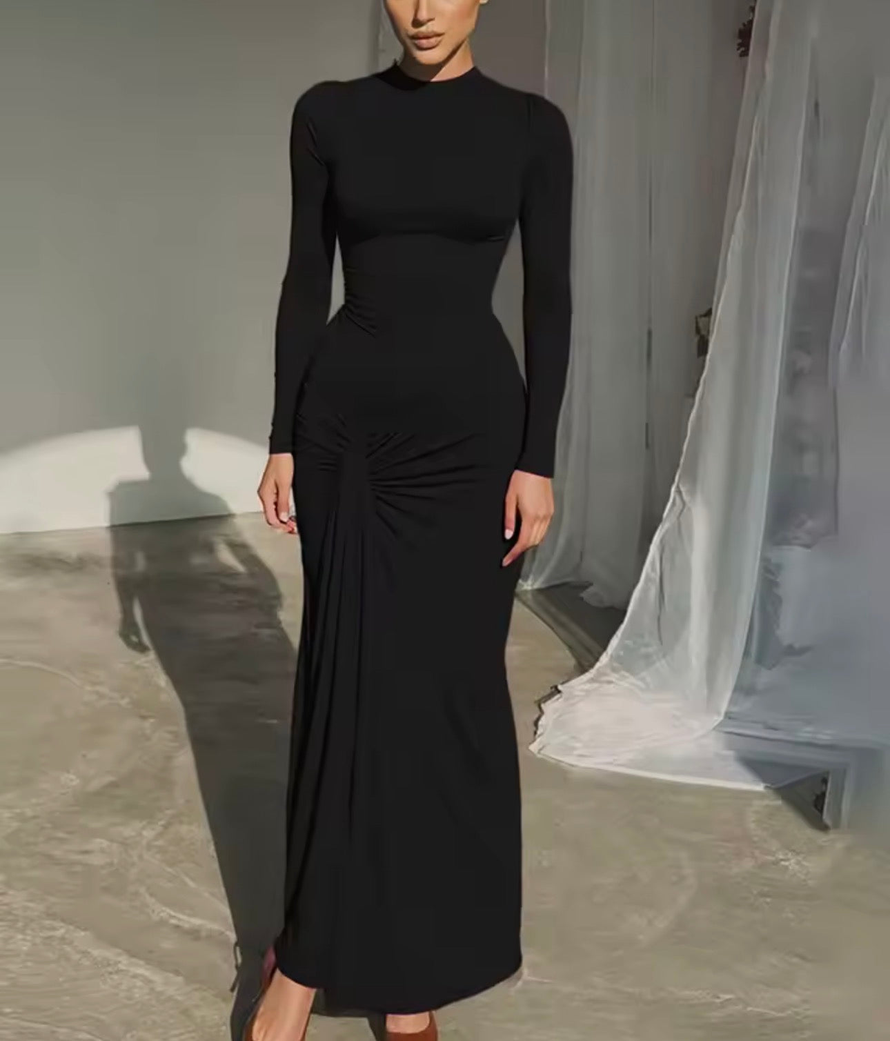 Abito lungo con nodo sotto la pancia