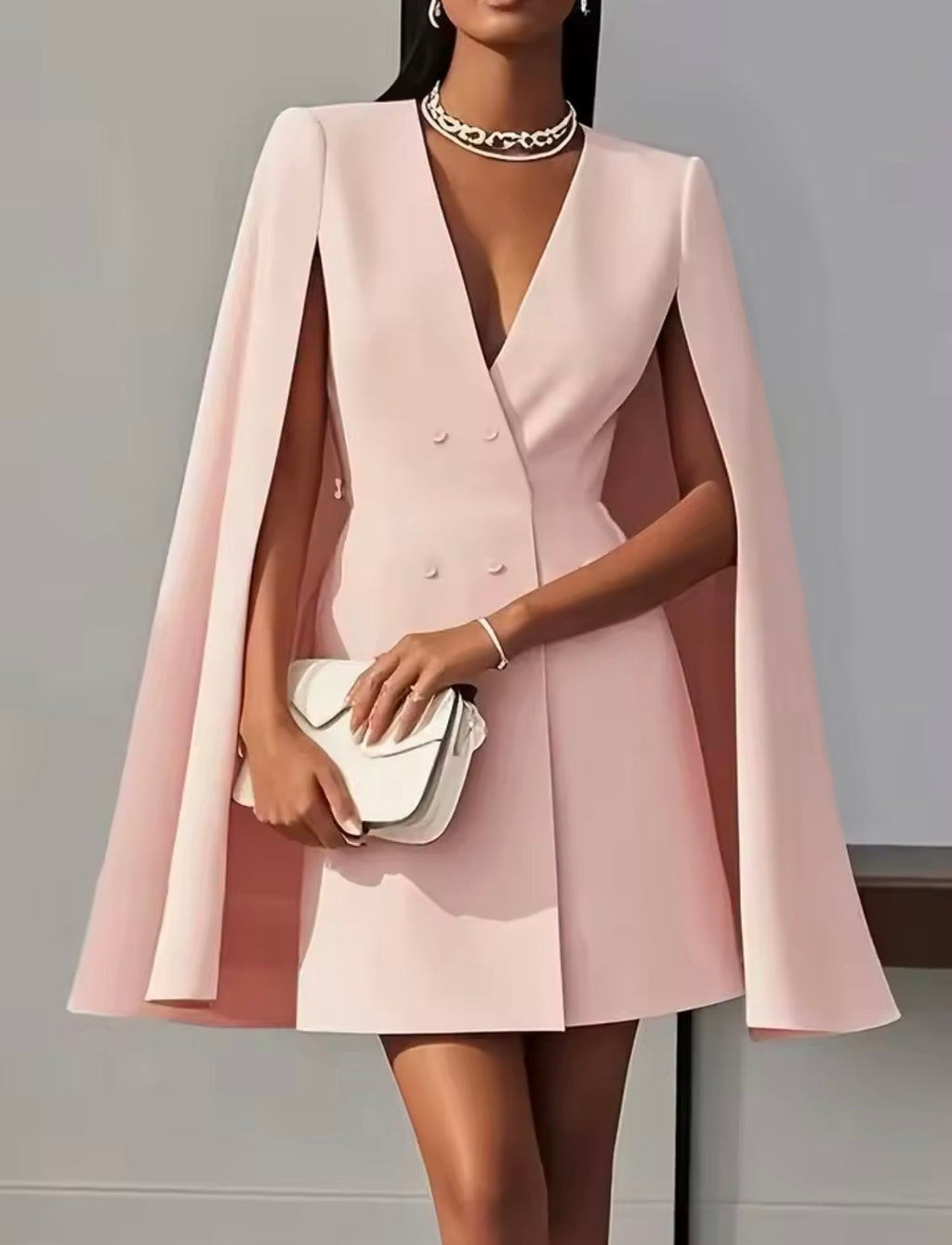 Abito da festa Elegante abito longuette con maniche a mantella