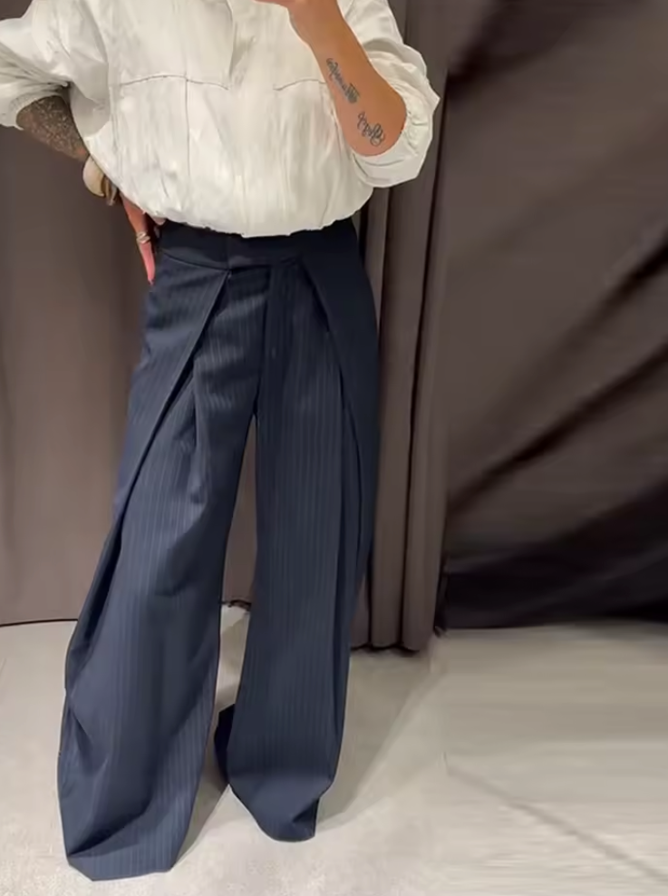 Pantaloni lunghi irregolari chic, larghi alla caviglia a vita alta